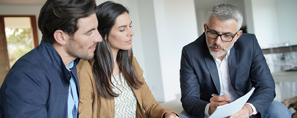 Couple meeting with a mortgage expert