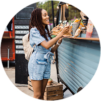 Girl getting food at food truck