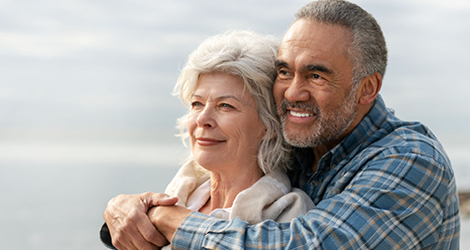 Elderly couple embracing