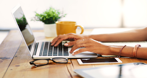 Person typing on computer