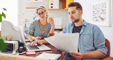 Young couple managing finances