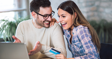 Young couple paying online