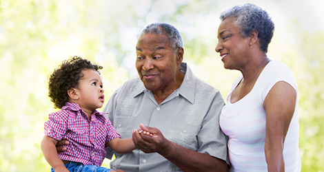 Elderly couple with grandkid